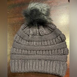 PRICED TO SELL- Woman’s warm dark grey knit hat with faux Pom Pom